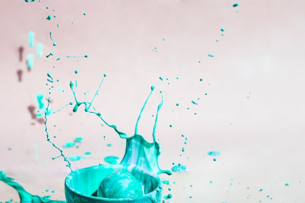 Free photo abstract background with green paint splash