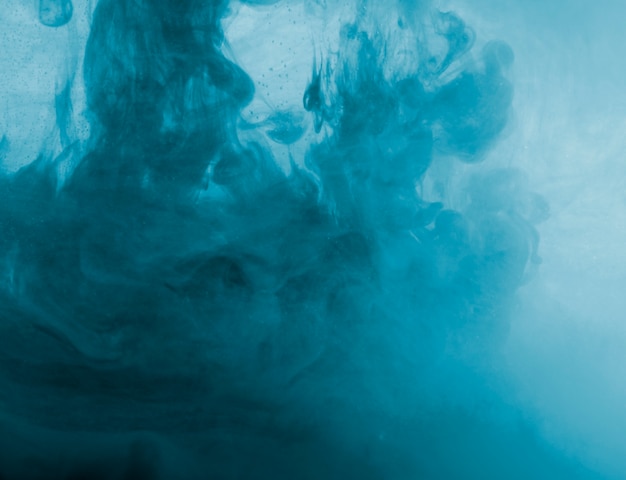 Free photo abstract blue cloud of haze in liquid