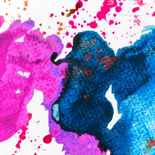 Free photo abstract blue and pink watercolor stain background