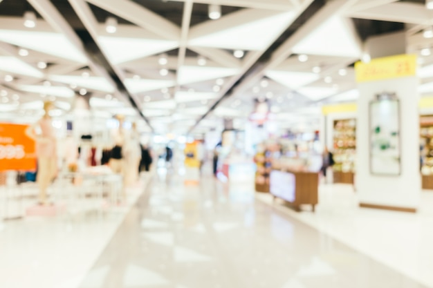 Free Photo abstract blur and bokeh defocused shopping mall interior of department store