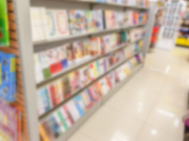 Abstract blur of  book on bookshelves in bookstore .