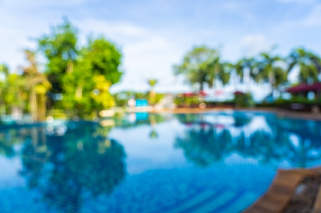 Abstract blur and defocus beautiful outdoor swimming pool in hotel resort, blurred photo background