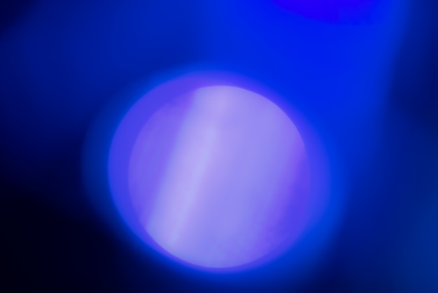 Abstract blurred background with blue lights