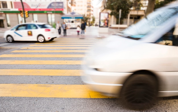 Abstract blurred cars; vehicles on street in the city