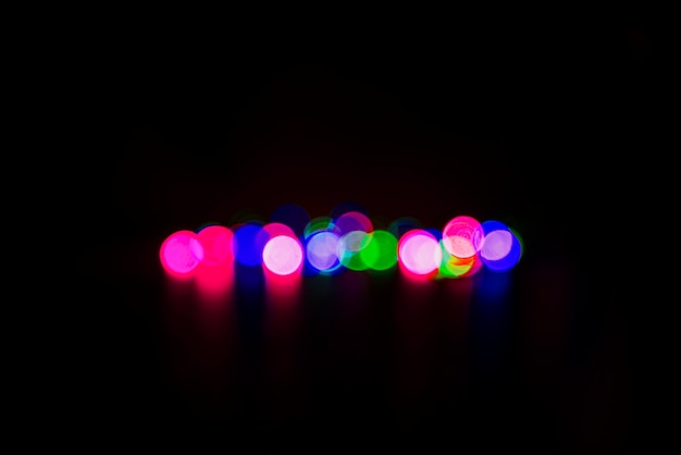 Free photo abstract bokeh background with colorful lights