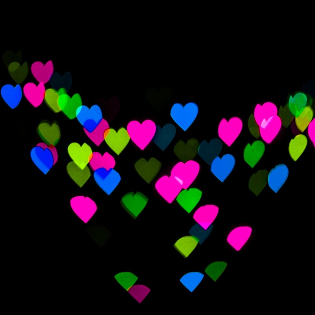 Abstract bokeh background with heart shaped lights