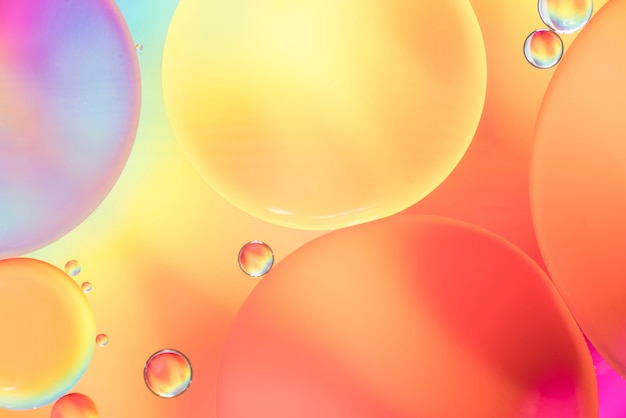 Free Photo abstract bubbles on colorful blurred background