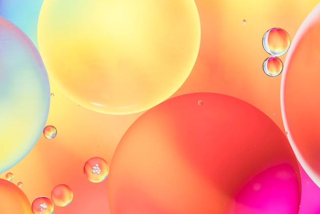 Free Photo abstract bubbles on colorful blurred background