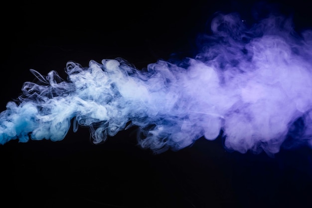 Abstract cigarette smoke on black background