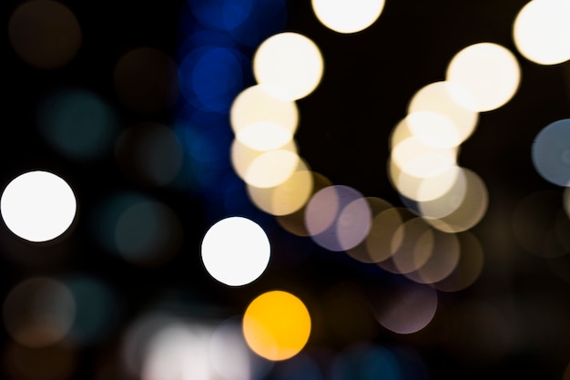 Free photo abstract circular lights blurred bokeh holiday background