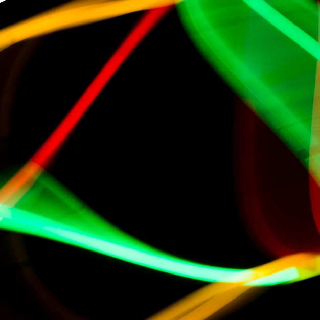 Free photo abstract colorful neon tubes on black background