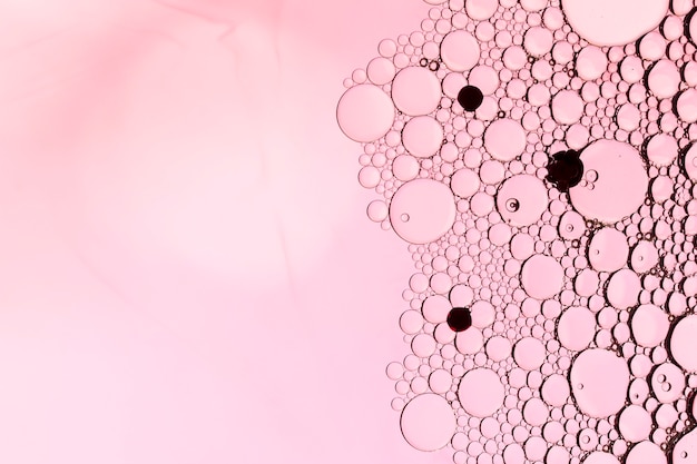 Free photo abstract frame with pink bubbles