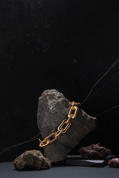 Abstract gold chain jewellery presentation