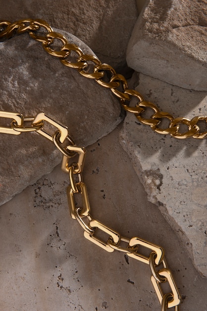 Abstract gold chain jewellery presentation