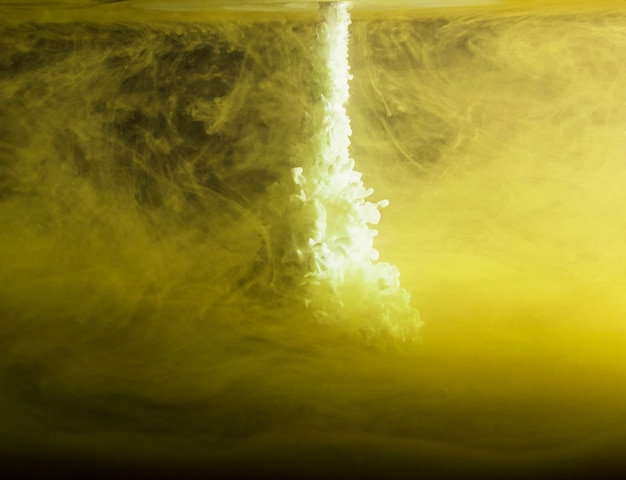 Abstract heavy yellow fog in liquid