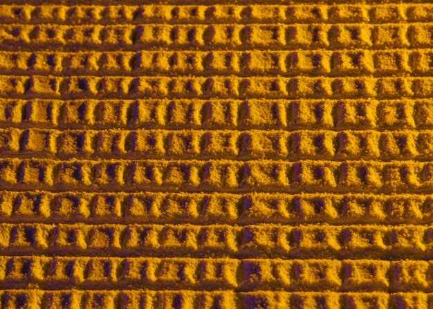 Abstract honeycomb with yellow sand