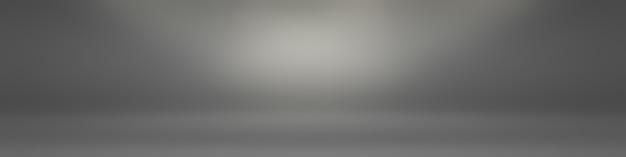 Free photo abstract luxury plain blur grey and black gradient, used as background studio wall for display your products.