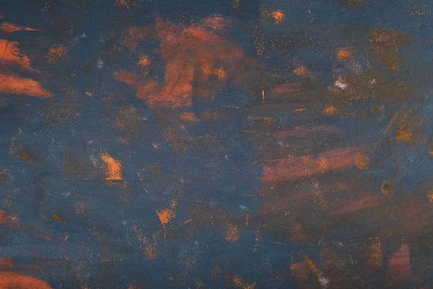 Free photo abstract marble art with blue and orange paint.