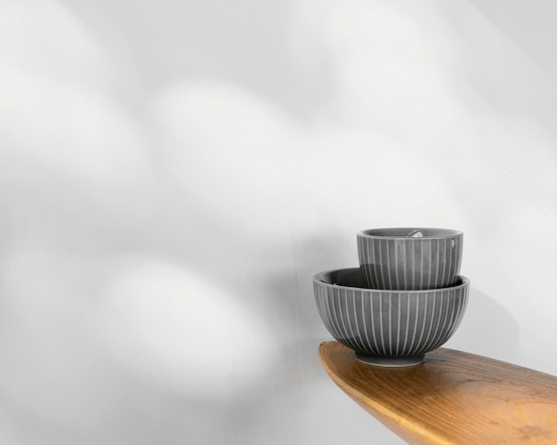 Abstract minimal kitchen bowls copy space front view