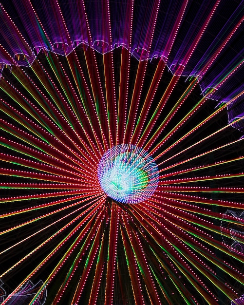 Free Photo abstract neon lights on a wonder wheel