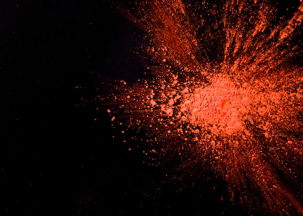 Abstract orange powder splatted background