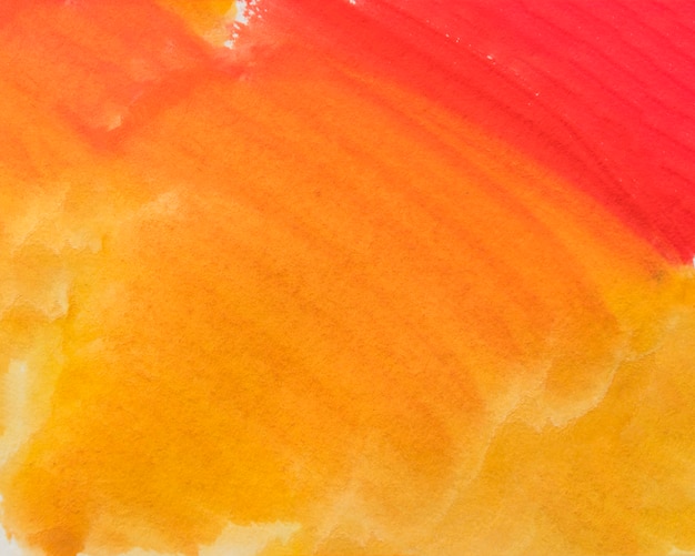 Free Photo abstract painted yellow and orange watercolor wet backdrop