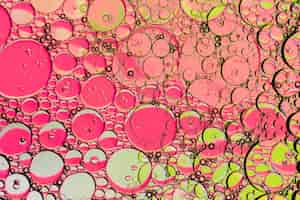 Free photo abstract pink bubble background