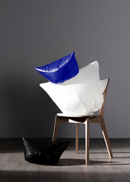 Free photo abstract plastic bag concept on chair