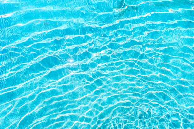 Abstract pool water surface and background with sun light reflection