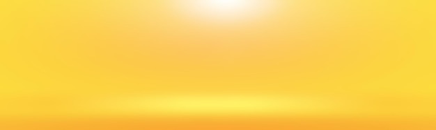 Abstract solid of shining yellow gradient studio wall room background