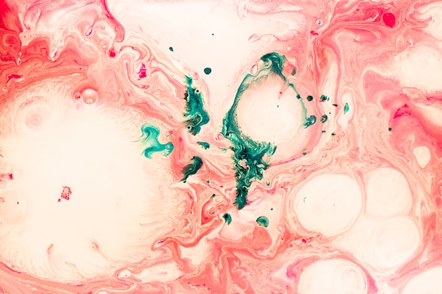 Free photo abstract splashes of paint with colored swirls