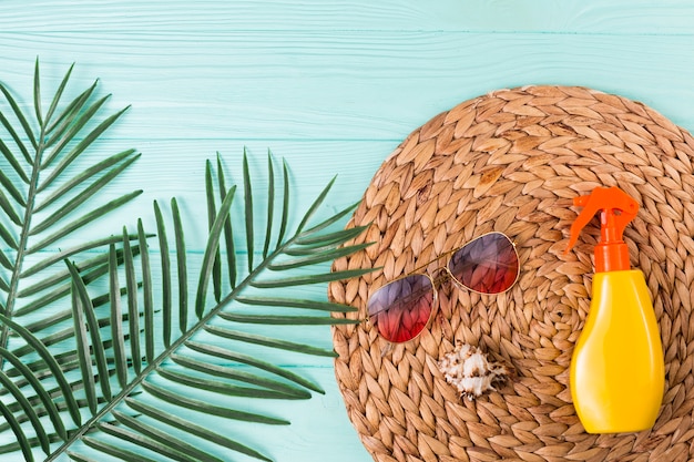 Accessories for beach leisure and palm leaves