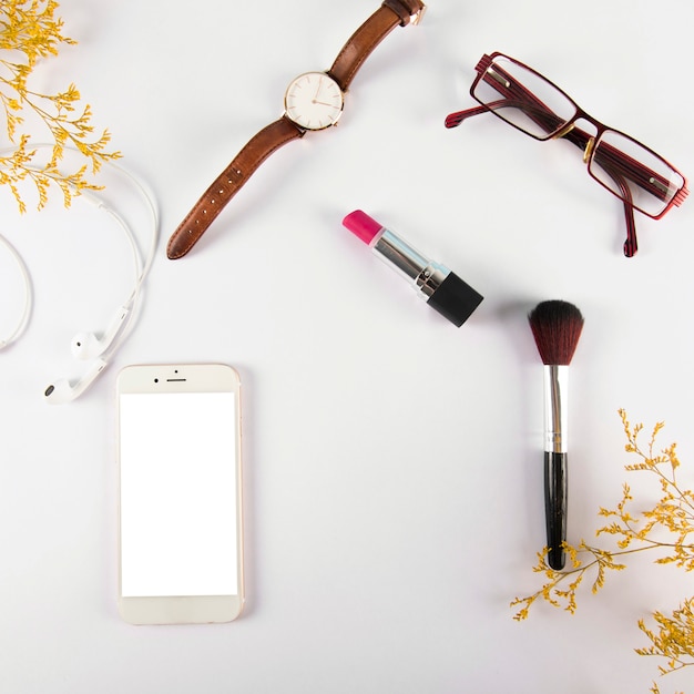 Free photo accessories and cosmetics near smartphone