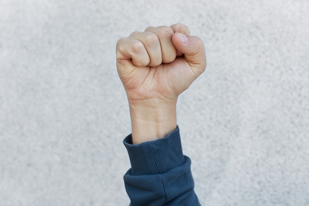 Free photo activist fist up during strike