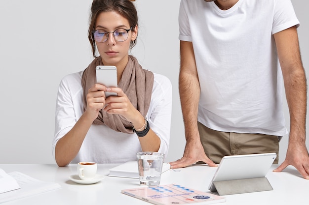 Addicted woman in round glasses