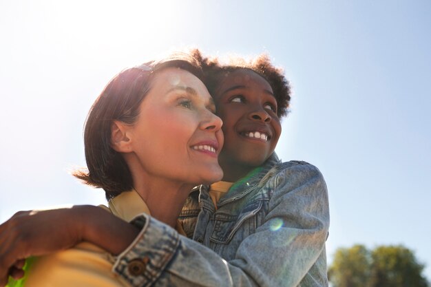 Adoptive mother spending time with her daughter