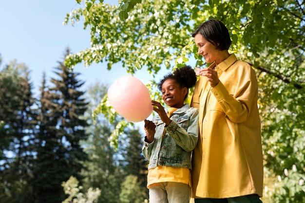 Adoptive mother spending time with her daughter