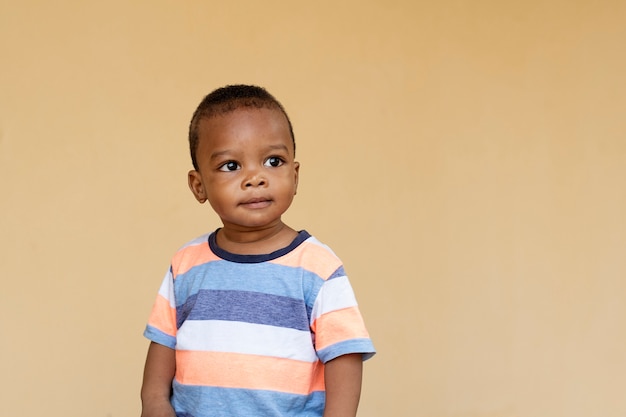 Adorable african black little boy