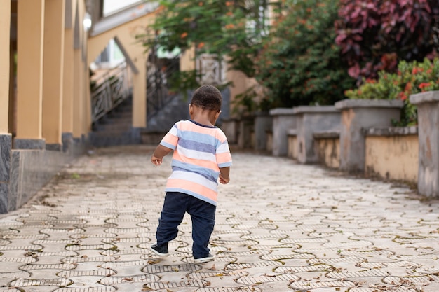 Adorable african black little boy