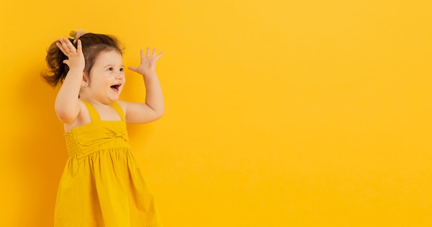 Adorable child posing with copy space