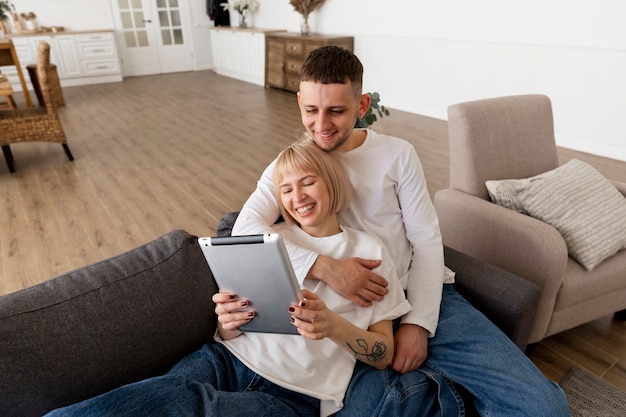 Adorable couple spending time together at home