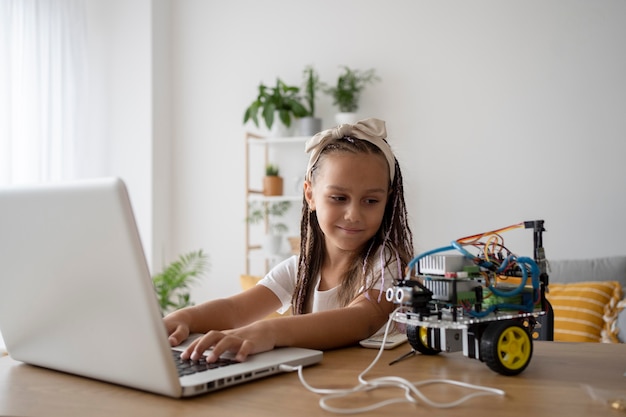 Free Photo adorable girl being passionate about robotics