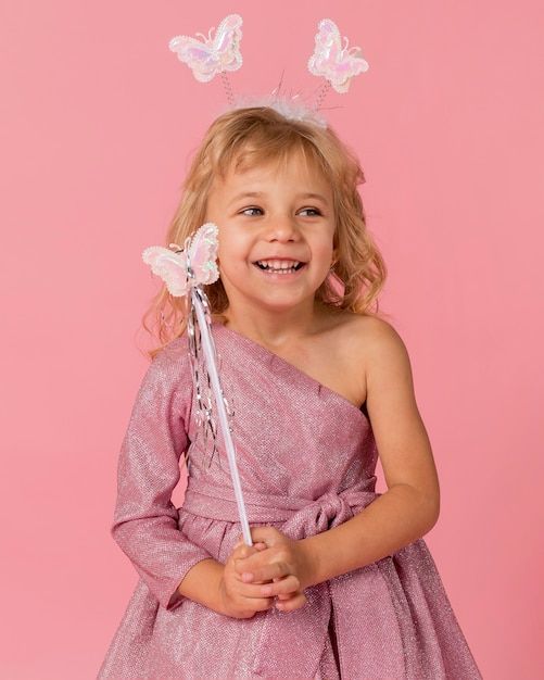 Adorable girl with fairy costume