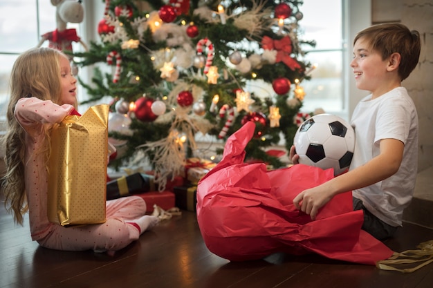 Adorable kids enjoying the christmas day