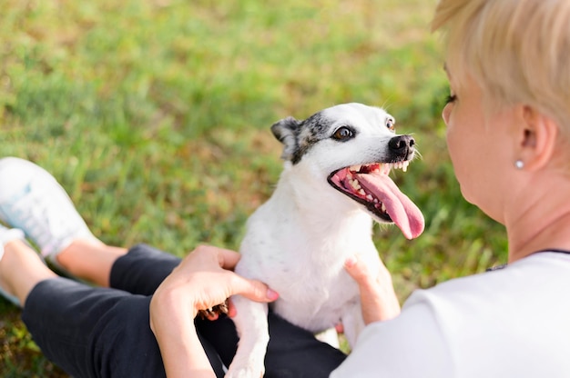 Adorable little dog enjoying nature