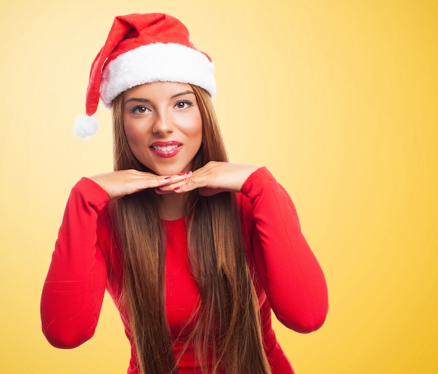 Free photo adorable teenager showing her hands next to her face