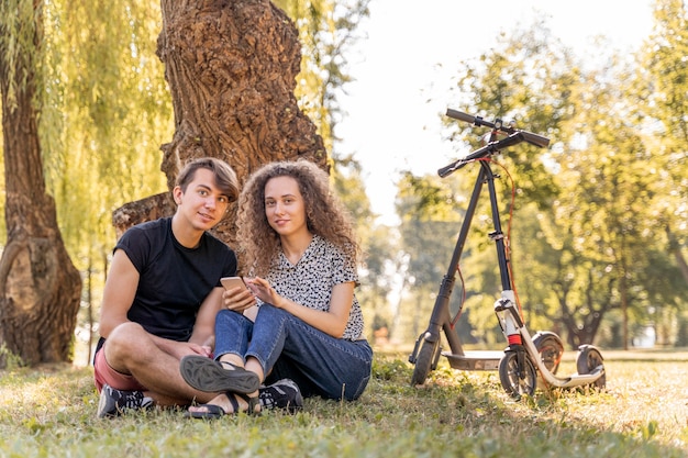 Adorable young couple relaxing outdoors