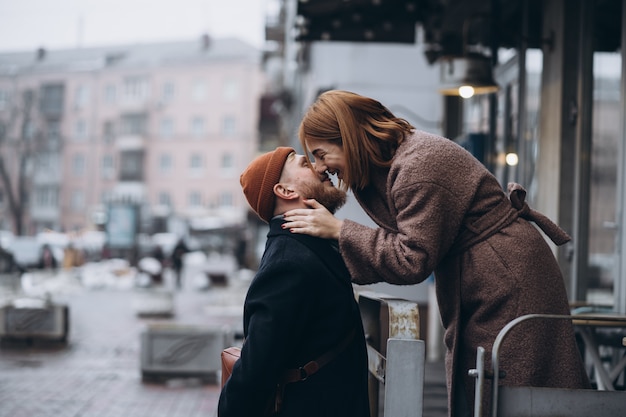 Free Photo adult loving couple kissing on a street