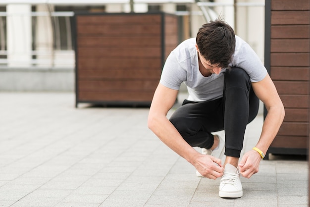 Adult male getting ready for jogging