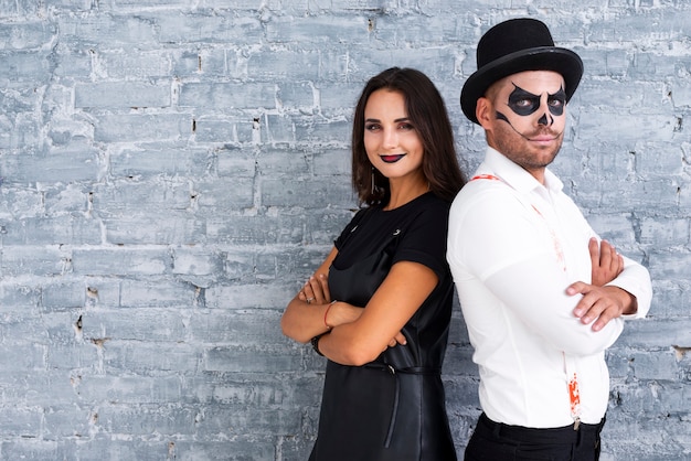 Adult male and woman dressed for halloween